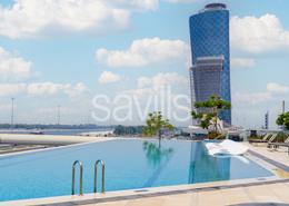 Pool image for: Apartment - 2 bedrooms - 2 bathrooms for rent in Capital Views - Capital Centre - Abu Dhabi, Image 1