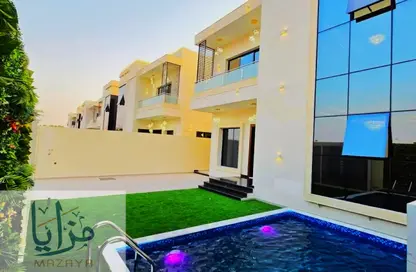 Villa - 5 Bedrooms - 7 Bathrooms for rent in Al Helio 2 - Al Helio - Ajman