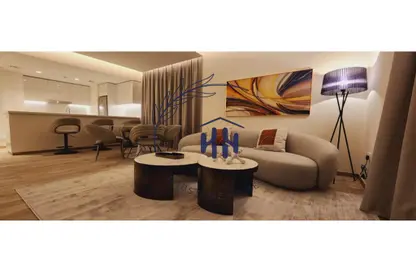 صورة لـ غرفة المعيشة شقة - غرفة نوم - 2 حمامات للايجار في أحد ريزيدنس - الخليج التجاري - دبي ، صورة رقم 1