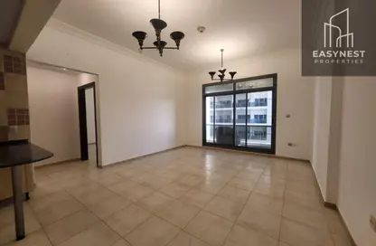 شقة - غرفة نوم - 2 حمامات للبيع في برج حمزة - مدينة دبي الرياضية - دبي