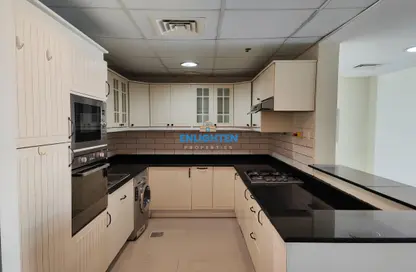 صورة لـ مطبخ شقة - 2 غرف نوم - 2 حمامات للايجار في برج مانهاتن - قرية الجميرا سركل - دبي ، صورة رقم 1
