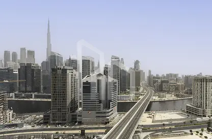 شقة - غرفة نوم - 2 حمامات للايجار في زا باراجون لآي جي او - الخليج التجاري - دبي