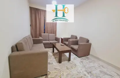 Living Room image for: Apartment - 1 Bedroom - 1 Bathroom for rent in Al Naemiya Tower 2 - Al Naemiya Towers - Al Nuaimiya - Ajman, Image 1