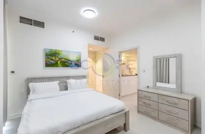 Room / Bedroom image for: Apartment - 1 Bedroom - 1 Bathroom for rent in Carson - DAMAC Hills - Dubai, Image 1