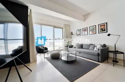 Living Room image for: Apartment - 1 Bedroom - 2 Bathrooms for sale in The Wave - Najmat Abu Dhabi - Al Reem Island - Abu Dhabi, Image 1