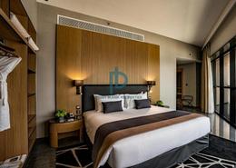 Room / Bedroom image for: Apartment - 1 bedroom - 2 bathrooms for sale in Sky Bay Hotel - Business Bay - Dubai, Image 1