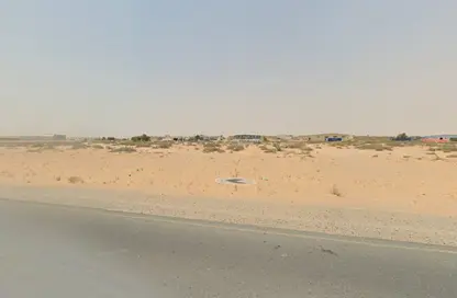 أرض - استوديو للبيع في مدينة الإمارات الصناعية - الشارقة