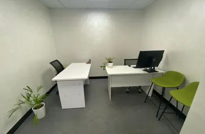 Office Space - Studio - 1 Bathroom for rent in Al Rostamani Building - Port Saeed - Deira - Dubai