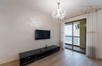 Living Room image for: Apartment - 3 Bedrooms - 4 Bathrooms for sale in Murjan 6 - Murjan - Jumeirah Beach Residence - Dubai, Image 1