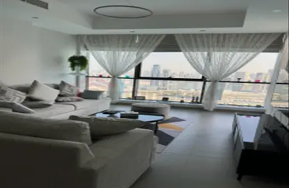 Living Room image for: Apartment - 1 Bedroom - 2 Bathrooms for rent in La Plage Tower - Al Mamzar - Sharjah - Sharjah, Image 1