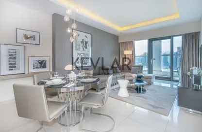 Living / Dining Room image for: Apartment - 1 Bedroom - 2 Bathrooms for sale in Tower B - DAMAC Towers by Paramount - Business Bay - Dubai, Image 1