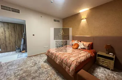 Apartment - 1 Bedroom - 2 Bathrooms for sale in Orient Tower 1 - Orient Towers - Al Bustan - Ajman