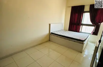 Apartment - 1 Bedroom - 1 Bathroom for sale in Paradise Lakes Towers - Emirates City - Ajman
