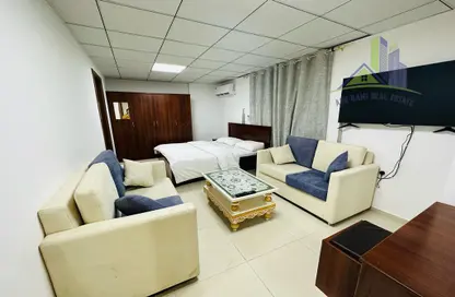 Living Room image for: Apartment - 2 Bathrooms for rent in Gulfa Towers - Al Rashidiya 1 - Al Rashidiya - Ajman, Image 1