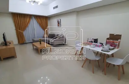 Living / Dining Room image for: Apartment - 1 Bedroom - 1 Bathroom for rent in Nuaimia One Tower - Al Nuaimiya - Ajman, Image 1