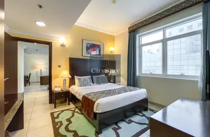 Room / Bedroom image for: Apartment - 1 Bedroom - 1 Bathroom for rent in Al Barsha 1 - Al Barsha - Dubai, Image 1