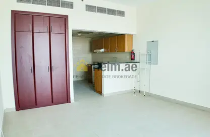 Apartment - 1 Bathroom for rent in Ice Hockey - Dubai Sports City - Dubai