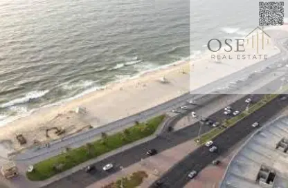 Apartment - 2 Bedrooms - 2 Bathrooms for sale in Corniche Tower - Ajman Corniche Road - Ajman