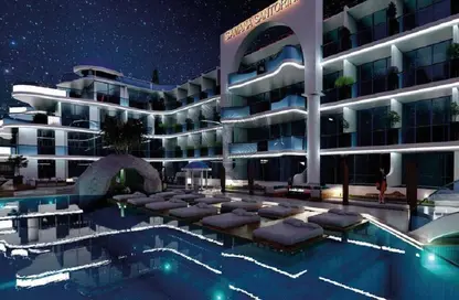 Pool image for: Apartment - 1 Bathroom for sale in Samana Santorini - Dubai Studio City - Dubai, Image 1
