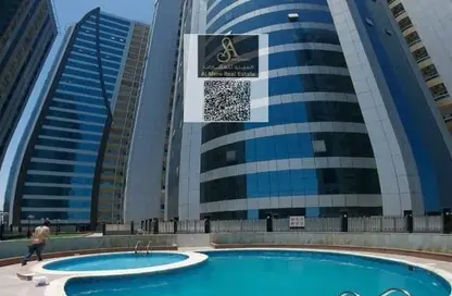 شقة - 2 غرف نوم - 2 حمامات للبيع في أورينت تاور 1 - أورينت تاور - البستان - عجمان