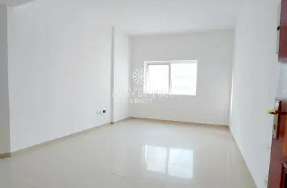 Empty Room image for: Apartment - 1 Bedroom - 1 Bathroom for rent in Robot Park Tower - Al Khan - Sharjah, Image 1