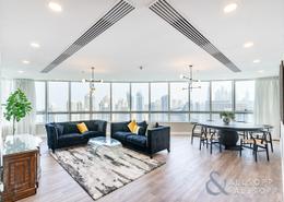 Living / Dining Room image for: Apartment - 4 bedrooms - 4 bathrooms for sale in Horizon Tower - Dubai Marina - Dubai, Image 1