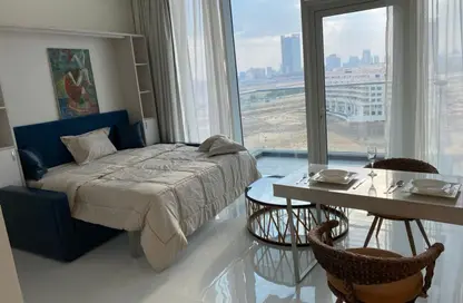 Apartment - Studio - 1 Bathroom for rent in Miraclz Tower by Danube - Arjan - Dubai