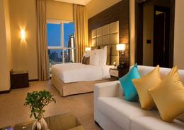Studio - 1 bathroom for rent in Jannah Burj Al Sarab - Mina Road - Tourist Club Area - Abu Dhabi Room / Bedroom image for: Studio - 1 bathroom for rent in Jannah Burj Al Sarab - Mina Road - Tourist Club Area - Abu Dhabi, Image 1
