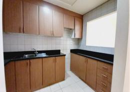 Kitchen image for: Apartment - 1 bedroom - 2 bathrooms for rent in The Gardens Buildings - The Gardens - Dubai, Image 1