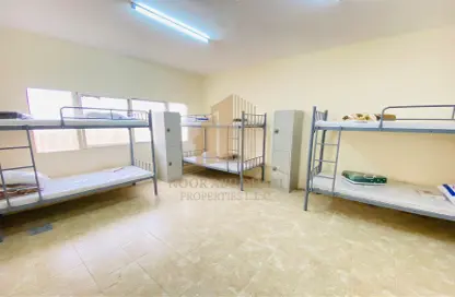 Room / Bedroom image for: Labor Camp - Studio for rent in Batha Al Hayer - Al Ain Industrial Area - Al Ain, Image 1