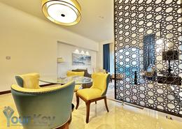 Living / Dining Room image for: Apartment - 2 bedrooms - 3 bathrooms for sale in Fairmont Marina Residences - The Marina - Abu Dhabi, Image 1