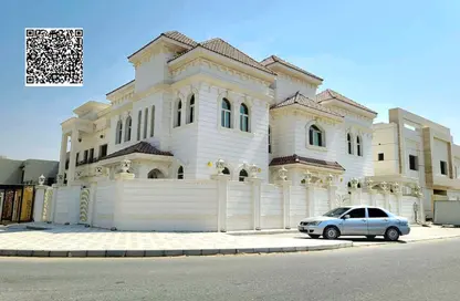 Villa - 5 Bedrooms - 7 Bathrooms for sale in Ajman Hills - Al Alia - Ajman