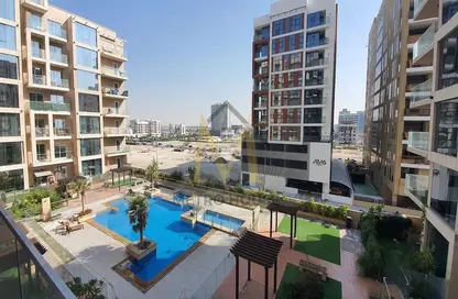 Pool image for: Apartment - 1 Bedroom - 1 Bathroom for sale in Sherena Residence - Majan - Dubai, Image 1