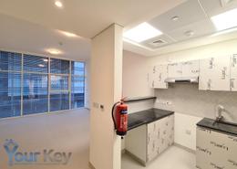 Kitchen image for: Studio - 1 bathroom for rent in Thanaya Building - Khalifa Park - Eastern Road - Abu Dhabi, Image 1