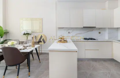 Kitchen image for: Apartment - 1 Bedroom - 2 Bathrooms for sale in La Residenza - Jumeirah Village Circle - Dubai, Image 1