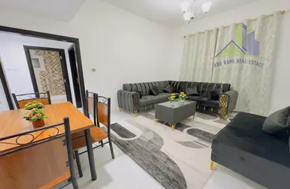 Living / Dining Room image for: Apartment - 1 Bedroom - 2 Bathrooms for rent in Geepas Building 3 - Al Rashidiya 2 - Al Rashidiya - Ajman, Image 1