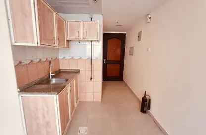 Apartment - Studio - 1 Bathroom for rent in Al Butina 9 Building - Al Butina - Sharjah