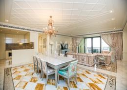 صورةغرفة المعيشة / غرفة الطعام لـ: شقة - 2 غرف نوم - 3 حمامات للكراء في بالازيو فيرساتشي - القرية التراثية - دبي, صورة 1