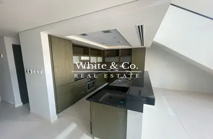 Kitchen image for: Duplex - 2 Bedrooms - 3 Bathrooms for rent in The Lofts East - The Lofts - Downtown Dubai - Dubai, Image 1