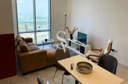 صورة لـ غرفة المعيشة / غرفة الطعام شقة - غرفة نوم - 2 حمامات للبيع في برج نورا - مدينة الحبتور - الخليج التجاري - دبي ، صورة رقم 1