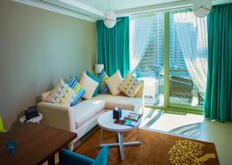 صورةغرفة المعيشة لـ: النزل و الشقق الفندقية - 2 غرف نوم - 3 حمامات للكراء في جنة بلايس في دبي مارينا - دبي مارينا - دبي, صورة 1