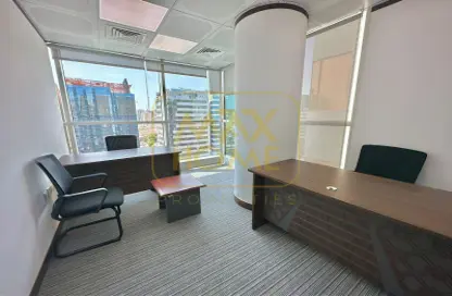 Office image for: Office Space - Studio - 2 Bathrooms for rent in Junaibi Tower - Al Danah - Abu Dhabi, Image 1