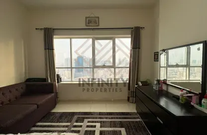 شقة - غرفة نوم - 2 حمامات للبيع في أورينت تاور 1 - أورينت تاور - البستان - عجمان