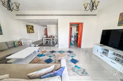 Living Room image for: Apartment - 2 Bedrooms - 2 Bathrooms for sale in Al Arta 3 - Al Arta - Greens - Dubai, Image 1