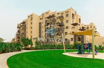 Outdoor Building image for: Apartment - 1 Bedroom - 2 Bathrooms for sale in Al Thamam 61 - Al Thamam - Remraam - Dubai, Image 1