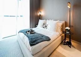 Room / Bedroom image for: Apartment - 3 bedrooms - 5 bathrooms for sale in Golf Promenade 4B - Golf Promenade - DAMAC Hills - Dubai, Image 1