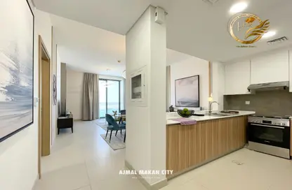 Kitchen image for: Apartment - 1 Bedroom - 2 Bathrooms for sale in Blue Bay - Al Nujoom Islands - Sharjah, Image 1