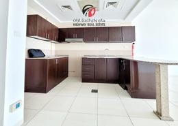 Kitchen image for: Apartment - 2 bedrooms - 2 bathrooms for rent in Midtown Central Majan - Majan - Dubai, Image 1