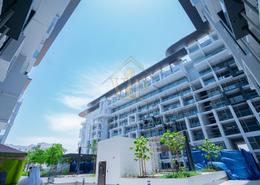 Outdoor Building image for: Duplex - 2 bedrooms - 3 bathrooms for sale in Oasis 1 - Oasis Residences - Masdar City - Abu Dhabi, Image 1