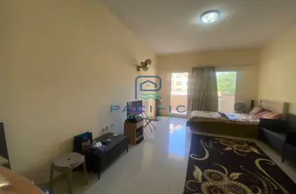 Living Room image for: Apartment - 1 Bathroom for sale in Fayrouz - Bab Al Bahar - Al Marjan Island - Ras Al Khaimah, Image 1